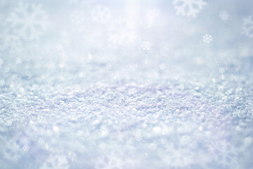 Macro texture of the snow surface with bokeh highlights, fabulous lighting effect and with a place for the inscription