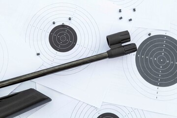 Targets and air rifle barrel. Airgun, pellets and target for shooting