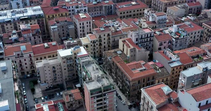 Aerial vertical view of the rooftops of Palermo, Sicily with the traffic and the building of the city center in the south of Italy