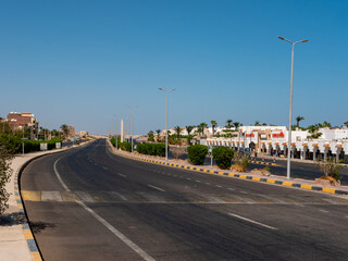 Safaga, Egypt - September 27, 2021: View of the main road stretching into the distance against the...