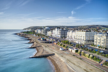 Eastbourne beach and Bandstand with Grand Parade running along the Seafront, Aerial view.