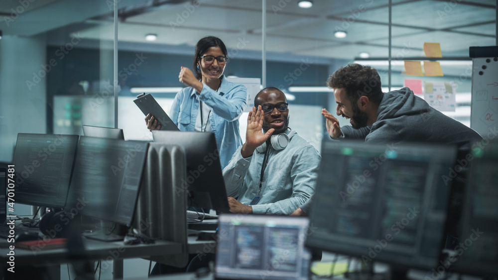 Poster Diverse Group of Professionals Celebrate Success in Modern Office: Brainstorming IT Programmers Use Computer, Talk, High-Five over Finding Brilliant Solution. Software Engineers Develop Innovative App