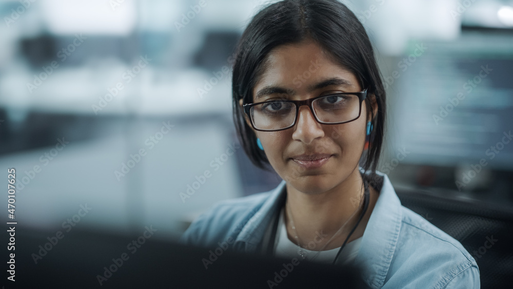 Aufkleber diverse office: portrait of empowered indian it programmer working on desktop computer. female speci