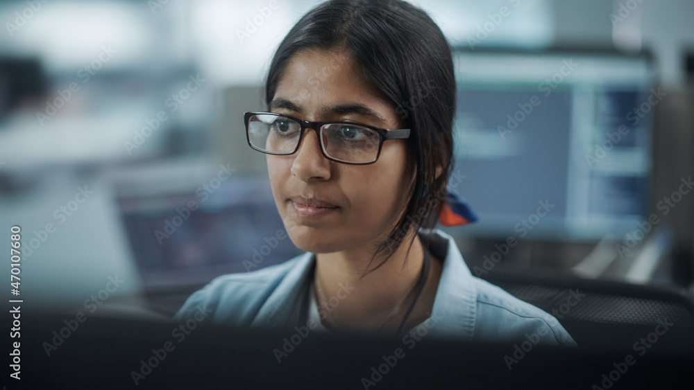 Poster Diverse Office: Portrait of Confident Indian IT Programmer Working on Desktop Computer. Female Specialist Wearing Glasses Create Innovative Software. Professional Engineer Develop Inspirational App