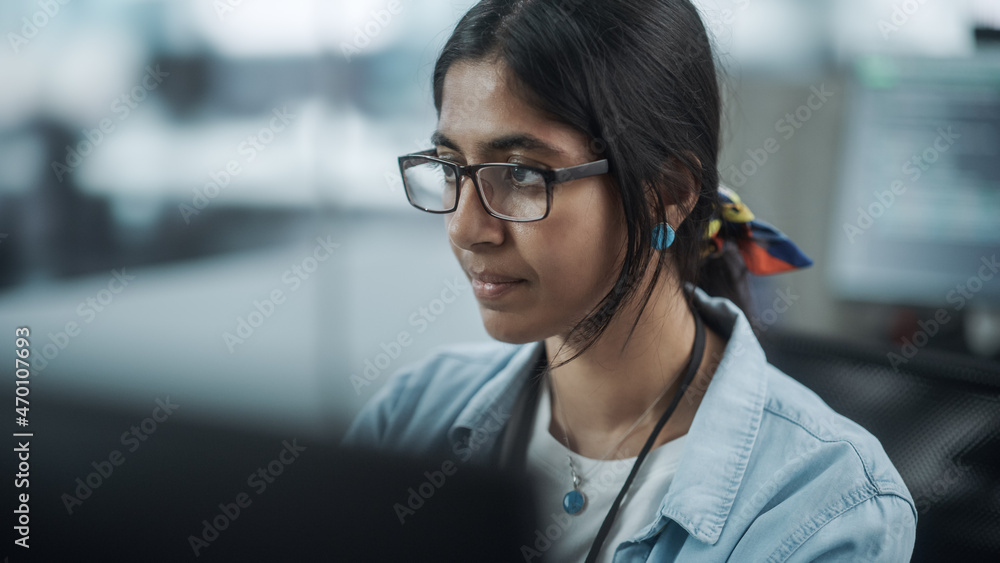 Leinwandbilder diverse office: portrait of confident indian it programmer working on desktop computer. female speci