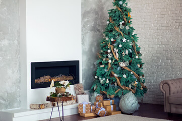 Decorated Christmas tree in living room. Botanical New Years in interior..
