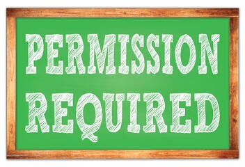 PERMISSION REQUIRED words on green wooden frame school blackboard © outchill