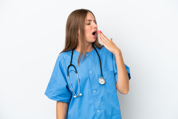 Young surgeon doctor Lithuanian woman isolated on white background yawning and covering wide open mouth with hand