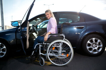 Fototapeta na wymiar Disabled woman making a safe approach to her automobile