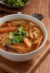 Delicious traditional thick soup with shrimp meat ball and vegetables.