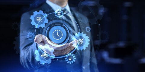 Time management planning productivity business concept. Businessman pressing button.