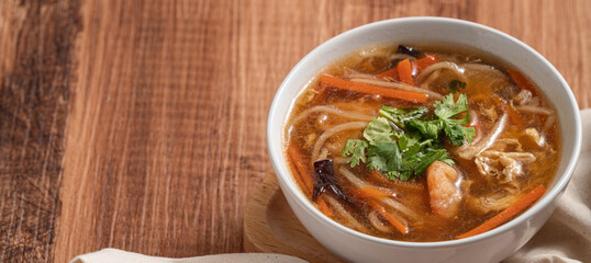 Delicious traditional thick soup with shrimp meat ball and vegetables.