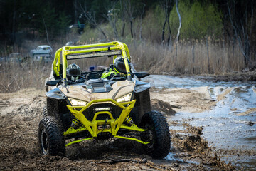 ATV and UTV offroad vehicle racing in hard track with mud splash. Extreme, adrenalin. 4x4.