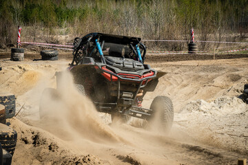 ATV and UTV racing in sand track. Amateur competitions. 4x4