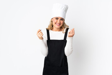 Young Brazilian chef woman isolated on white background making money gesture