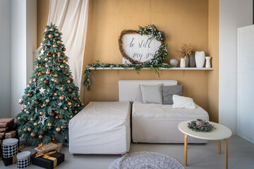 Spacious and light living room decorated for Christmas
