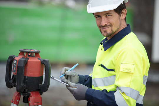 portrait of a geometer at construction site