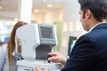 portrait of ophthalmologist in medical center