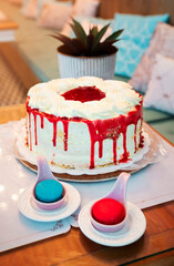 birthday cake, cream cake with red caramel sauce and strawberry.