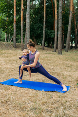 Mommy and Me Yoga for Babies and Postpartum Moms. Zen Family Yoga. Postpartum mother and baby girl...