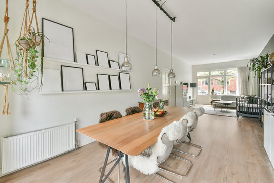 Table with flowers in decorated apartment