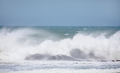 Rocky coastline on Diaz Point with power sea wave - Luederitz, Namibia