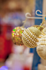 Christmas toy on the Christmas tree. New Year decoration. Decorated shop window