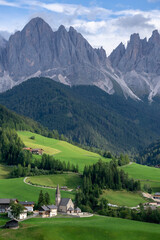 Fototapeta na wymiar Beautiful picturesque landscape of the village of Santa Maddalena. Dolomites. Italy.