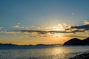 Naklejka na ściany i meble Sunset in the Seto Inland Sea, looking toward the Kasaoka Islands from Yorishima-cho