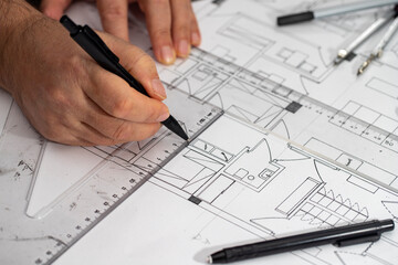 Naklejka na ściany i meble Architect Engineer Design Working on Blueprint Planning Concept. Construction Concept. Selective focus
