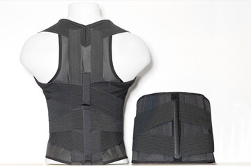 Orthopedic corsetry with lumbar support on a mannequin. Lumbar support belt. Lumbar belt.