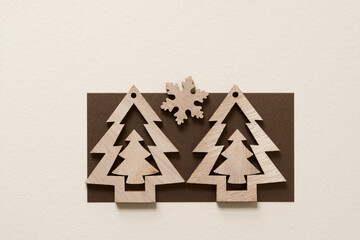 rustic christmas trees and snowflake shape on paper