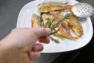 rosemary and fried fish
