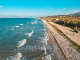 Fototapeta na wymiar Aerial drone view of windy beach in north corfu greece