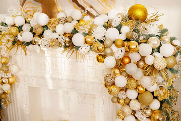 Christmas tree decorations on white fireplace