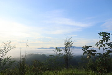 157 / 5000
Translation results
Morning atmosphere at 06.45 at the top of Batu Putih with a view of light fog, East Awangbangkal Village, Banjar Regency, South Kalimantan Province, Indonesia 