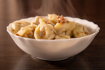 A plate of hot dumplings on the table
