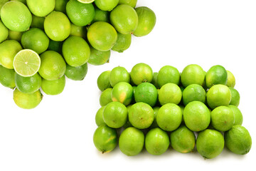 Many fresh limes on white background.