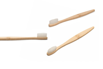 Bamboo toothbrush isolated on a white background.