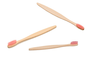 Bamboo toothbrush isolated on a white background.