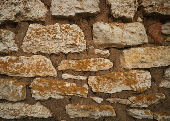 background wall of uneven white stones