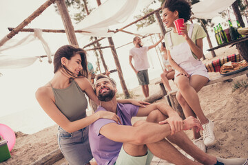 Photo of pretty sweet young friends wear casual clothes talking laughing smiling outside countryside