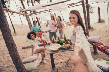 Obraz na płótnie Canvas Photo of friends meeting lady take boyfriend hand invite party wear casual clothes nature summer seaside beach