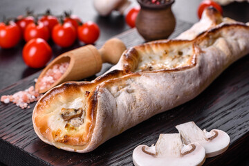 Delicious fresh street pizza with chicken, mushrooms and cheese