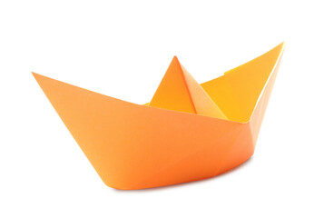 Handmade orange paper boat isolated on white. Origami art