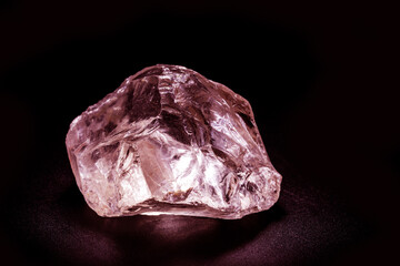 colored rose quartz, esoteric stone, isolated black background