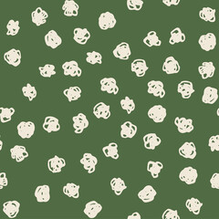 Polka dot beige abstract seamless pattern on green background. Vector design for textile, backgrounds, clothes, wrapping paper, web sites and wallpaper. Fashion illustration seamless pattern.