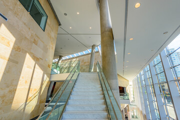 Abstract fragment of the architecture of modern lobby, hallway of the luxury hotel, shopping mall, business center in Vancouver, Canada. Interior design.