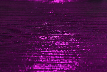 Purple velvet fabric texture used as background. Empty violet fabric background of soft and smooth textile material. There is space for text..
