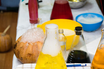 Experiments with chemistry for children during the halloween celebration